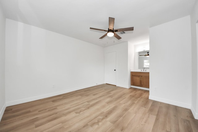 interior space featuring light hardwood / wood-style floors and sink