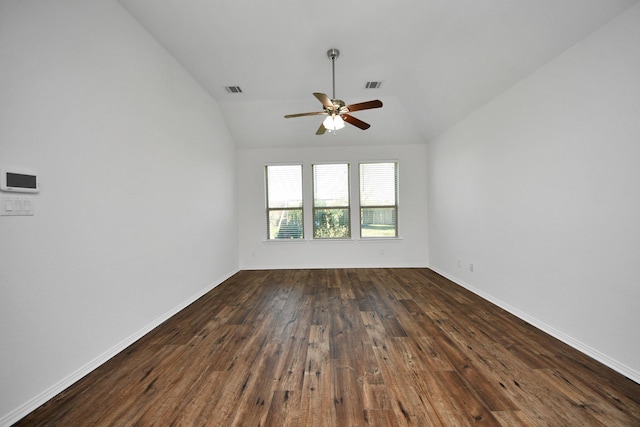 unfurnished room with vaulted ceiling, ceiling fan, and dark hardwood / wood-style floors