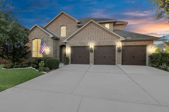 view of front of property featuring a garage