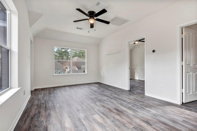 unfurnished room with lofted ceiling, hardwood / wood-style flooring, and ceiling fan