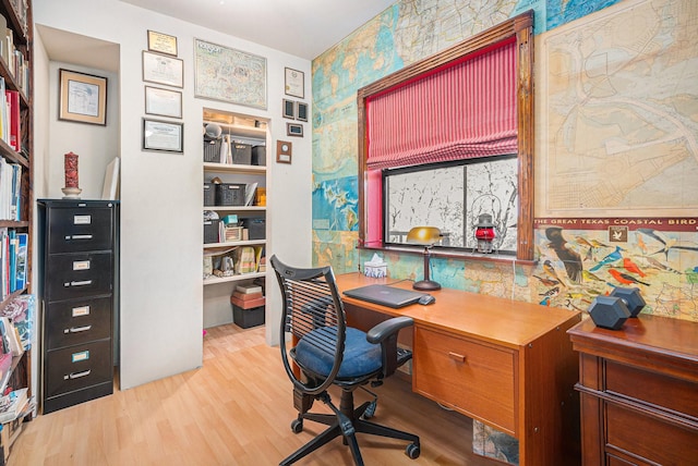 home office with hardwood / wood-style flooring