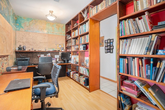 office with light hardwood / wood-style flooring