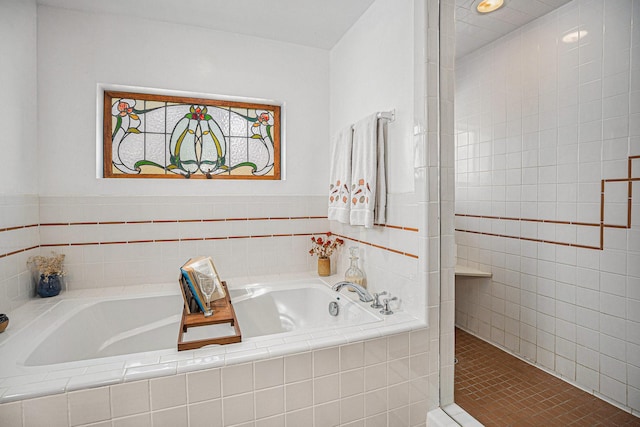 bathroom featuring independent shower and bath and tile patterned flooring