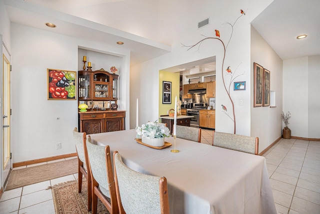 dining space with light tile patterned flooring