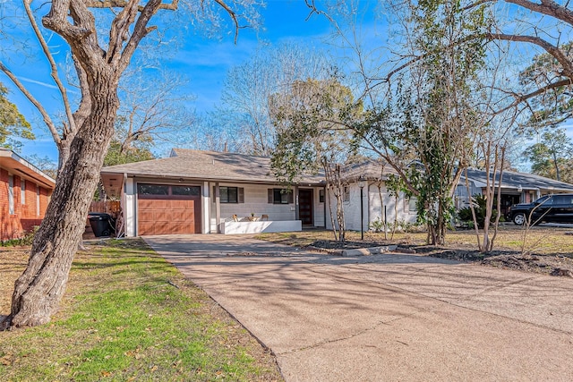 ranch-style house with a garage