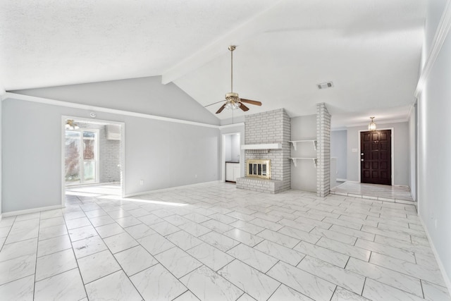 unfurnished living room with ceiling fan, vaulted ceiling with beams, a fireplace, and a textured ceiling