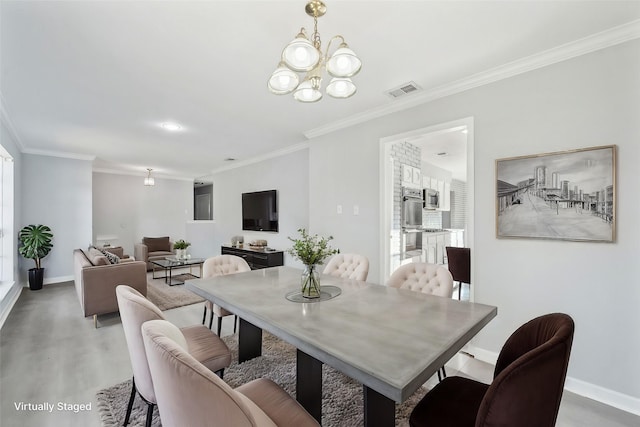 dining space featuring an inviting chandelier and crown molding