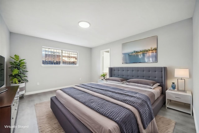 bedroom featuring dark hardwood / wood-style flooring