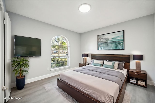 bedroom featuring hardwood / wood-style floors