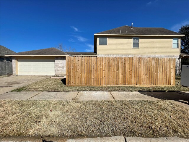 view of home's exterior featuring a garage