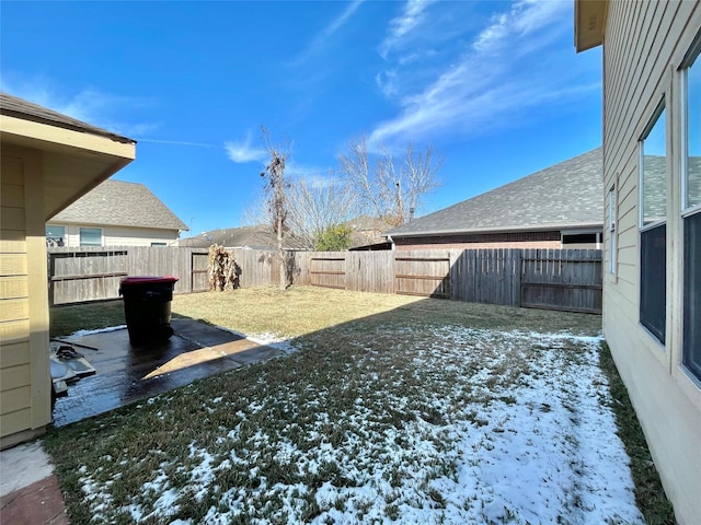 view of yard covered in snow