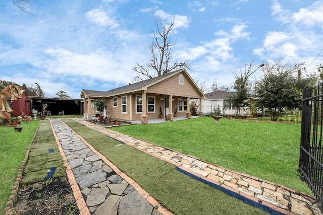 rear view of property with a porch and a yard