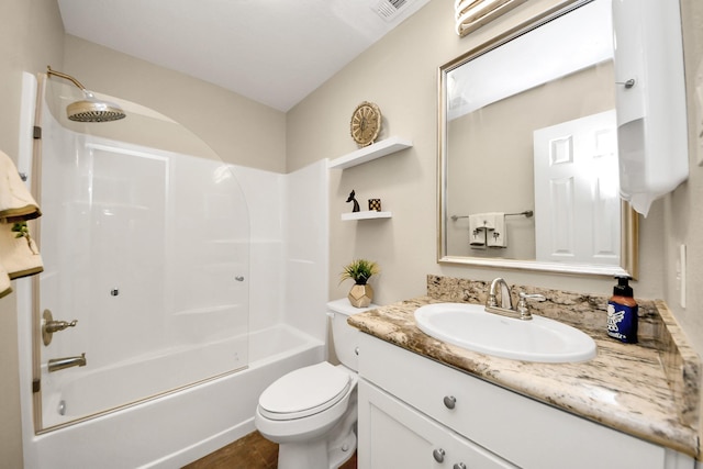 full bathroom featuring toilet, vanity, and shower / bathtub combination