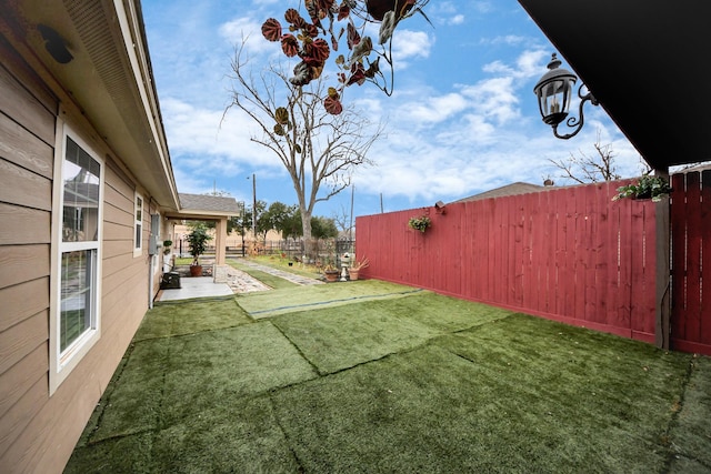 view of yard with a patio area