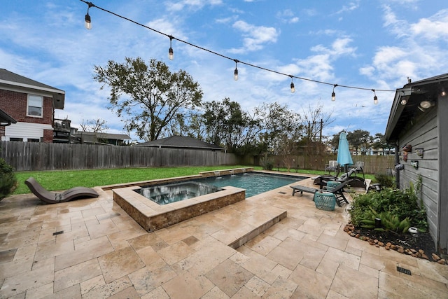 view of swimming pool with an in ground hot tub and a patio