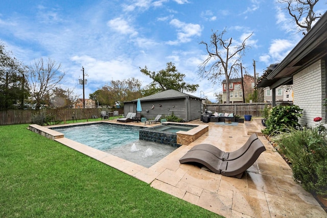 view of pool with a patio area, outdoor lounge area, an in ground hot tub, pool water feature, and a yard