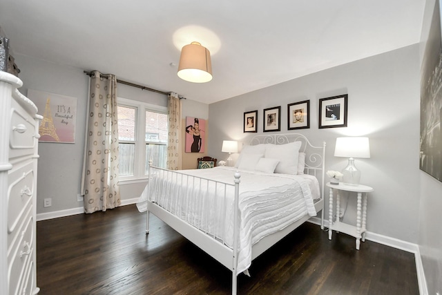 bedroom featuring dark hardwood / wood-style floors