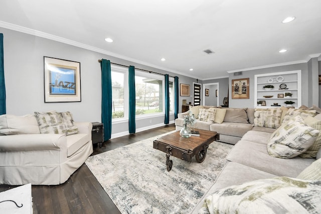 living room featuring crown molding, wood-type flooring, and built in shelves