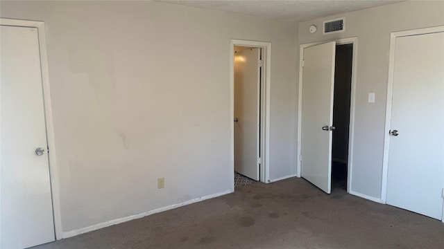 unfurnished bedroom with carpet flooring