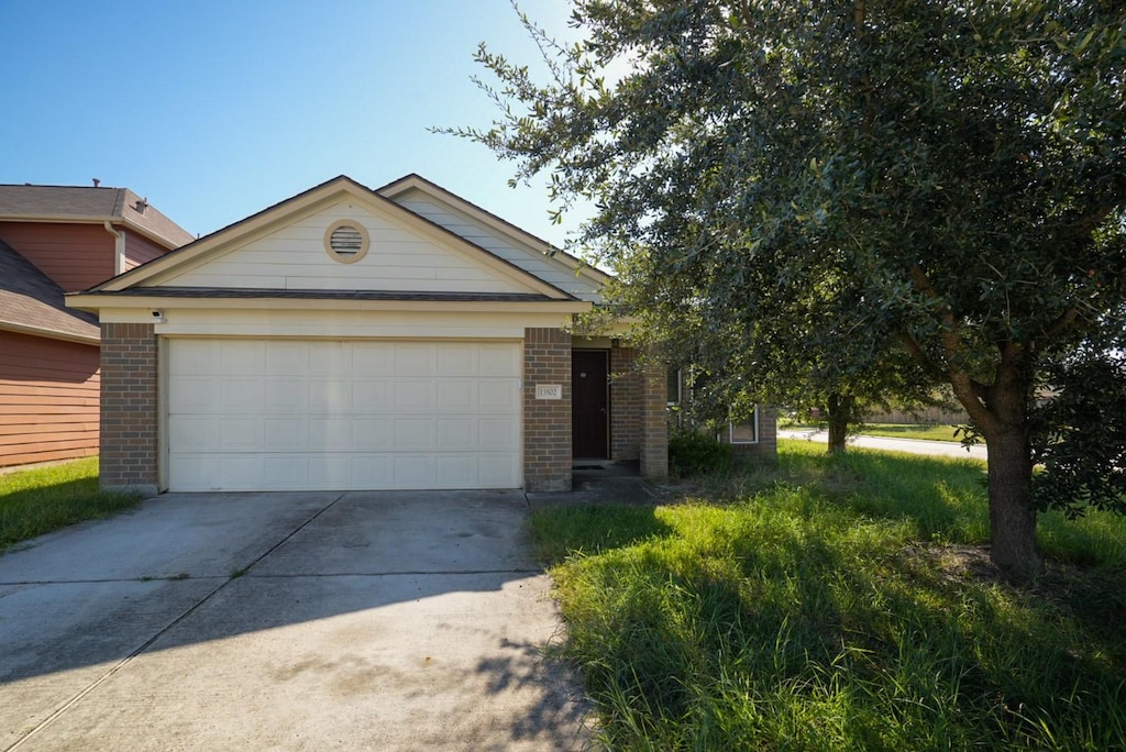 view of front of house featuring a garage and an outdoor structure