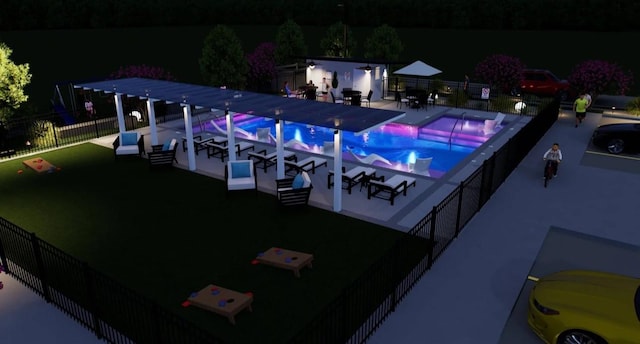 pool at twilight featuring a patio area