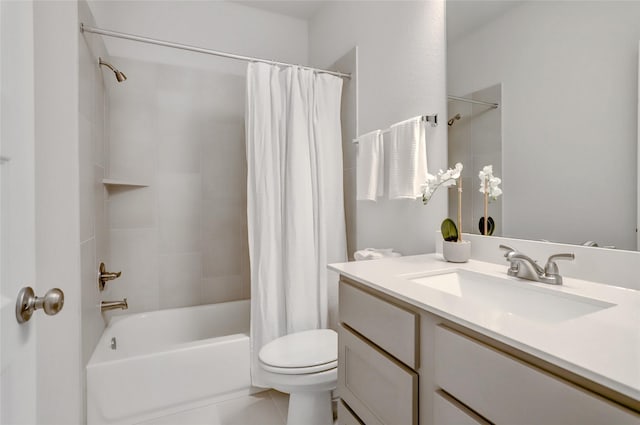 full bathroom featuring toilet, vanity, and shower / bath combo with shower curtain