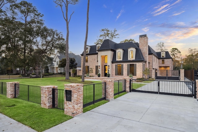 view of front of house with a lawn