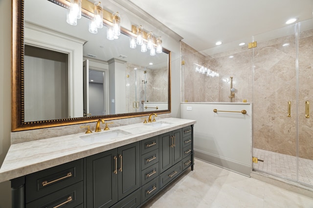 bathroom featuring an enclosed shower, vanity, and tile walls