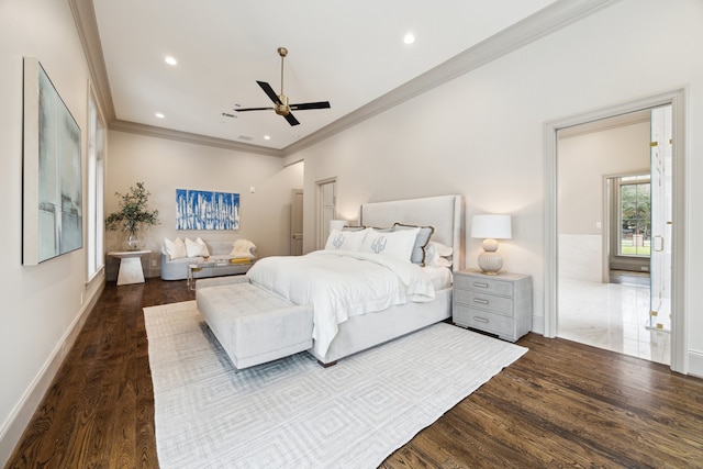 bedroom featuring hardwood / wood-style flooring, ceiling fan, and crown molding