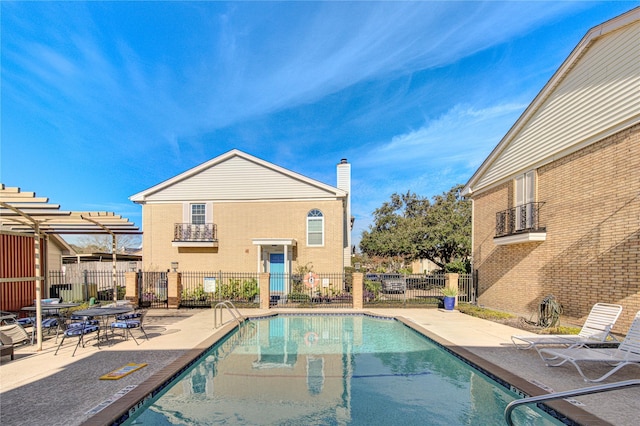 view of swimming pool featuring a patio