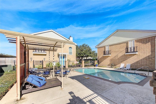 view of swimming pool featuring a patio