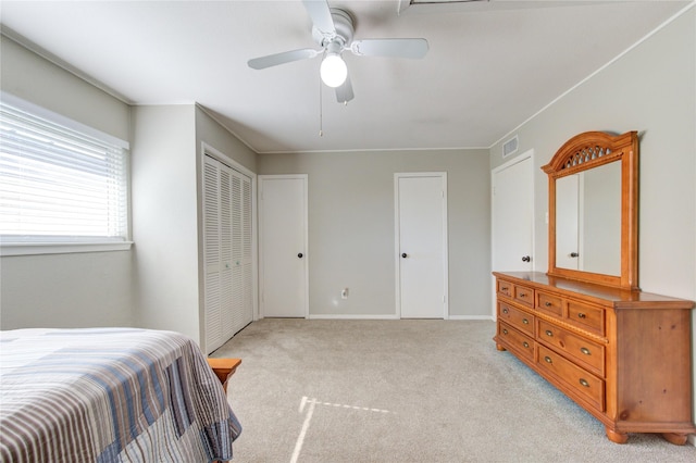 carpeted bedroom featuring ceiling fan