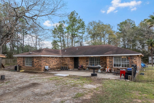 back of property with a patio area