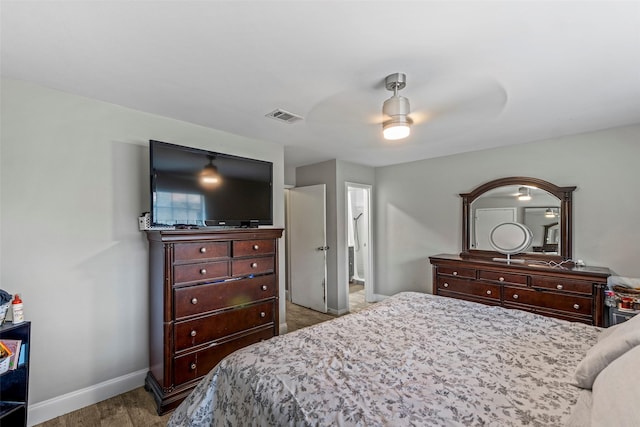 bedroom with light wood-type flooring and ceiling fan