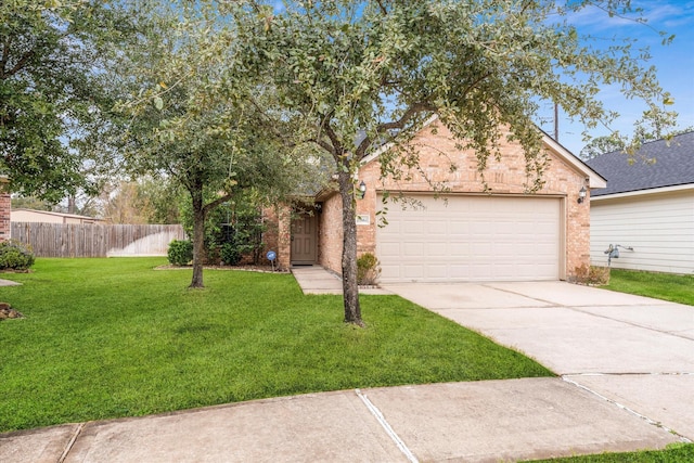 view of front facade with a garage and a front yard