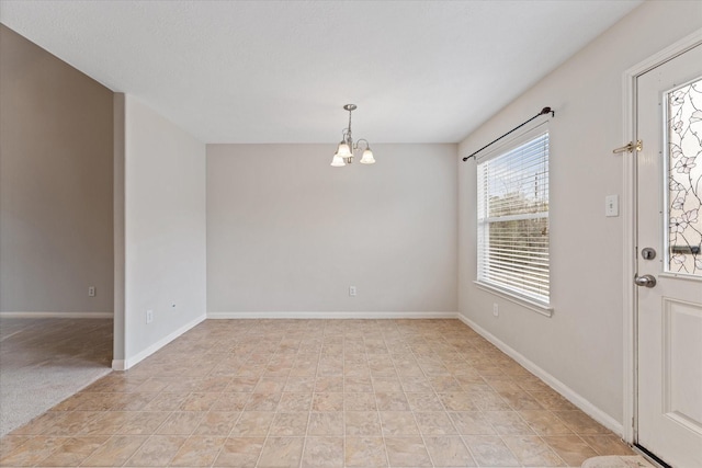 empty room with a chandelier