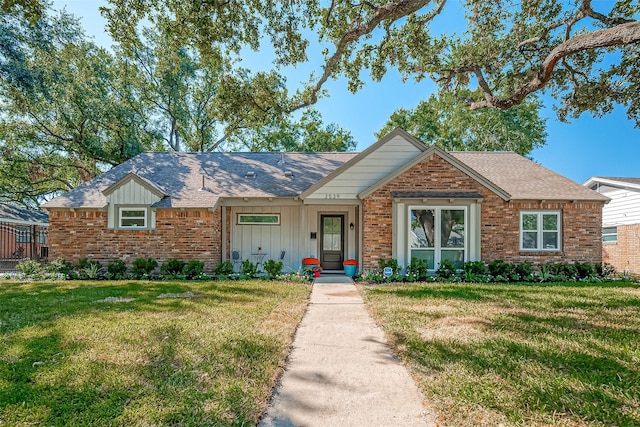 ranch-style house with a front lawn