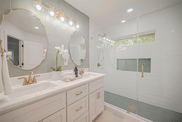 bathroom with vanity, tile patterned floors, and an enclosed shower