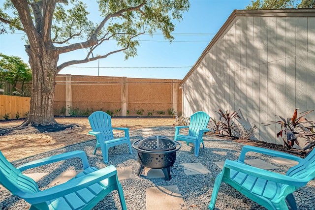 view of patio / terrace featuring a fire pit