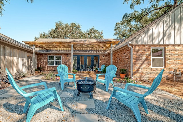 view of patio / terrace featuring a fire pit and a pergola