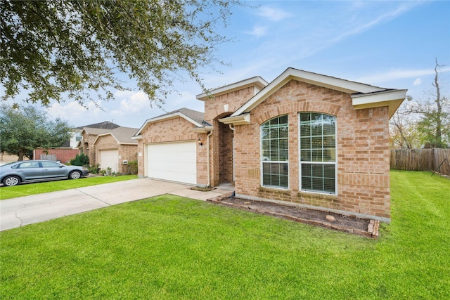 view of front of house with a garage and a front yard