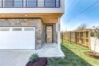 entrance to property featuring a garage