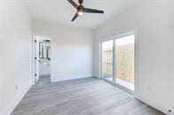 unfurnished room with ceiling fan