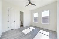 unfurnished bedroom with ceiling fan