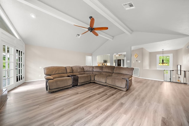 living room with french doors, ceiling fan, light hardwood / wood-style floors, and vaulted ceiling with beams