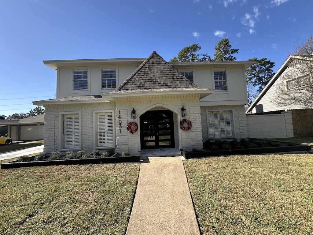 view of front of home with a front yard