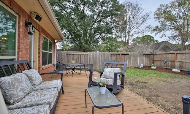 deck with an outdoor hangout area