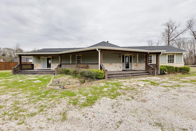 single story home featuring a porch