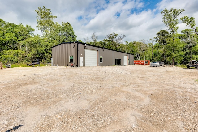 view of outdoor structure featuring a garage