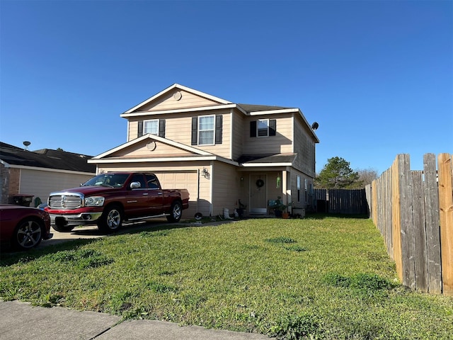 front facade featuring a garage and a front lawn